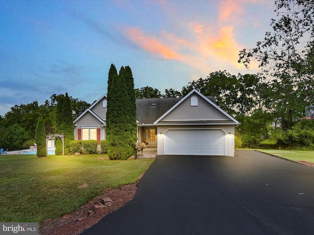 1353 Stag Dr, Auburn, PA 17922 - view of front of home with driveway, an attached garage, and a front lawn