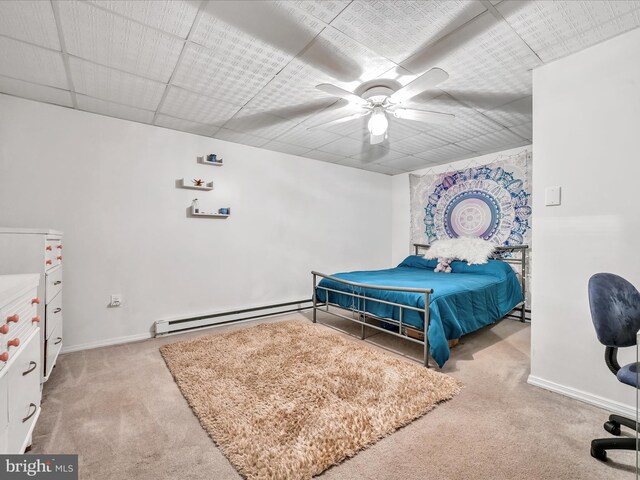 1353 Stag Dr, Auburn, PA 17922 - carpeted bedroom featuring baseboard heating, baseboards, and ceiling fan