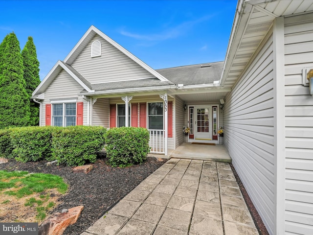 1353 Stag Dr, Auburn, PA 17922 - view of exterior entry with a porch and a shingled roof