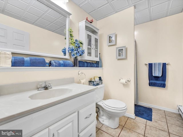 1353 Stag Dr, Auburn, PA 17922 - bathroom with vanity, toilet, baseboards, tile patterned floors, and an ornate ceiling