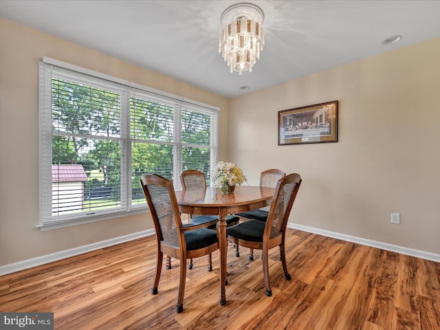 1353 Stag Dr, Auburn, PA 17922 - dining space with baseboards, a chandelier, and light wood finished floors