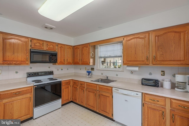 197 Victoria Ct, Doylestown, PA 18901 - kitchen featuring black microwave, range with electric cooktop, dishwasher, and backsplash