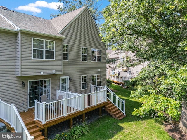 197 Victoria Ct, Doylestown, PA 18901 - rear view of house featuring a wooden deck, a lawn, stairs, and a shingled roof