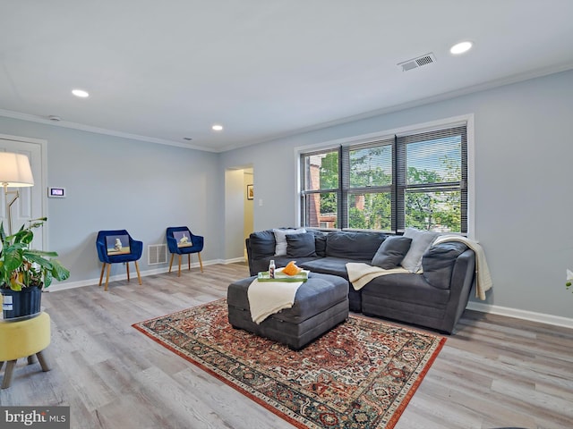 5019 Just St NE, Washington, DC 20019 - living area with wood finished floors, crown molding, baseboards, and recessed lighting