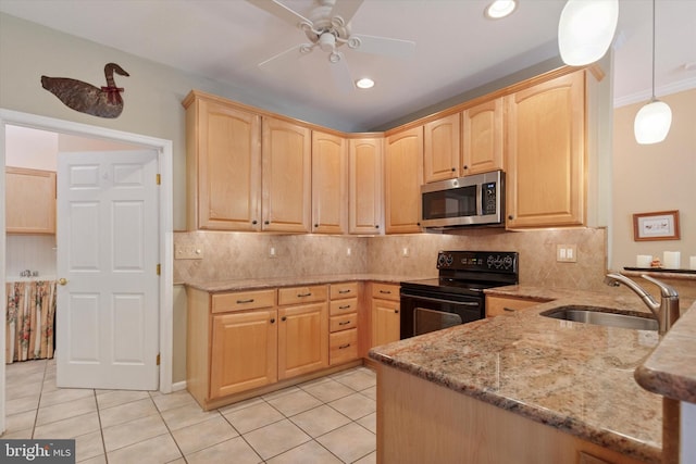 151 Lattice Ln, Collegeville, PA 19426 - kitchen featuring stainless steel microwave, electric range, light brown cabinets, light stone countertops, and light tile patterned floors