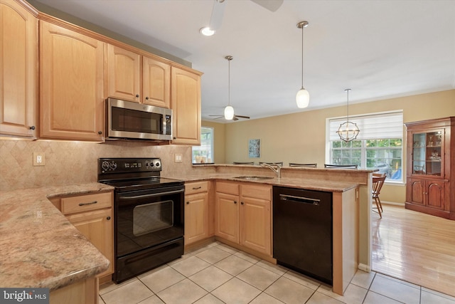 151 Lattice Ln, Collegeville, PA 19426 - kitchen with black appliances, a ceiling fan, a peninsula, and light brown cabinetry