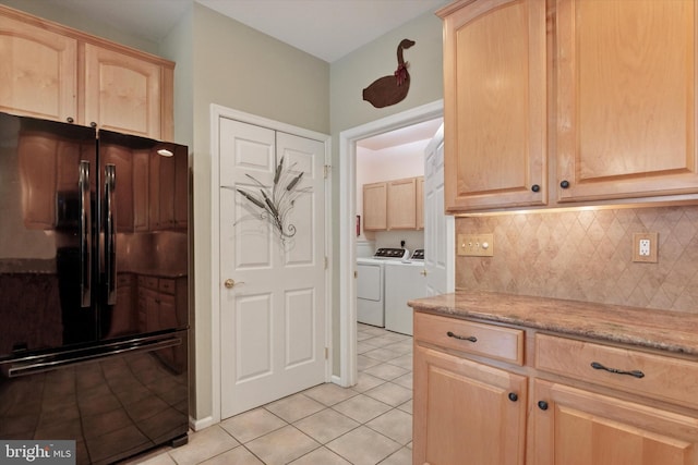 151 Lattice Ln, Collegeville, PA 19426 - kitchen with freestanding refrigerator, light brown cabinets, washer and dryer, light tile patterned flooring, and backsplash