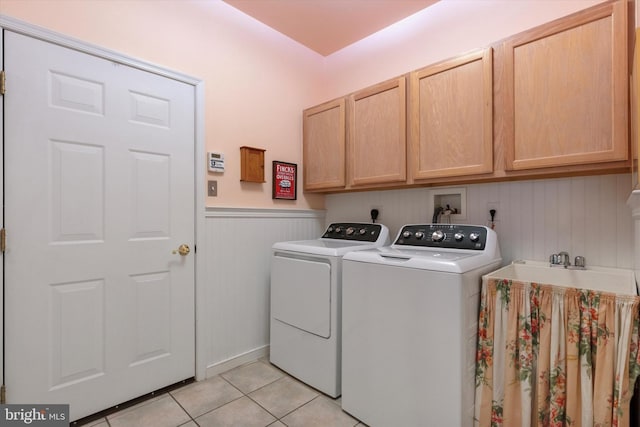151 Lattice Ln, Collegeville, PA 19426 - laundry area featuring cabinet space, washing machine and dryer, wainscoting, and light tile patterned floors