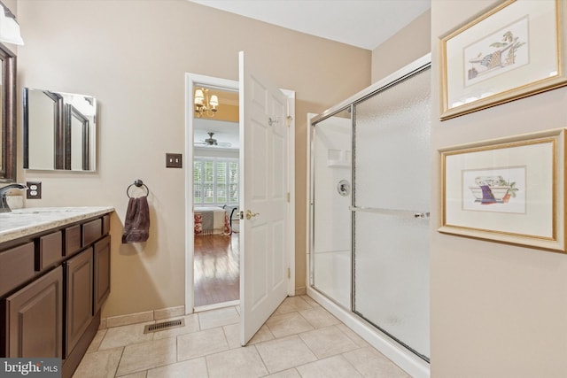 151 Lattice Ln, Collegeville, PA 19426 - ensuite bathroom featuring vanity, a shower stall, a ceiling fan, and tile patterned floors