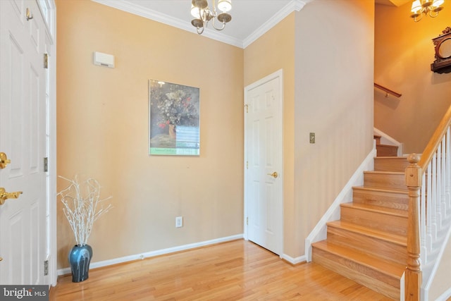 151 Lattice Ln, Collegeville, PA 19426 - entrance foyer with wood finished floors, ornamental molding, stairway, and a chandelier