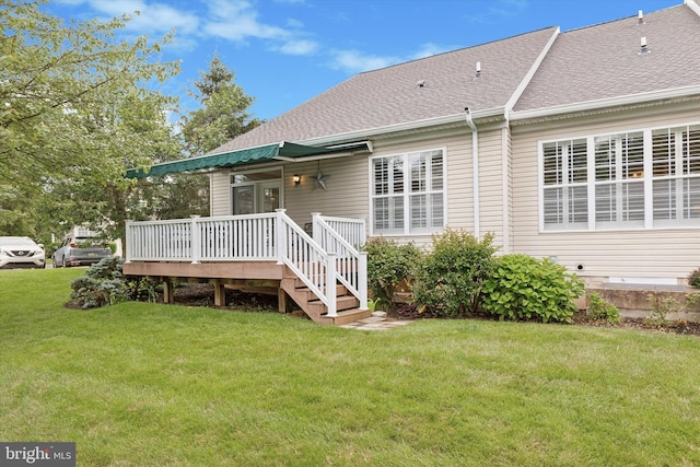 151 Lattice Ln, Collegeville, PA 19426 - rear view of house featuring a yard, a deck, and roof with shingles