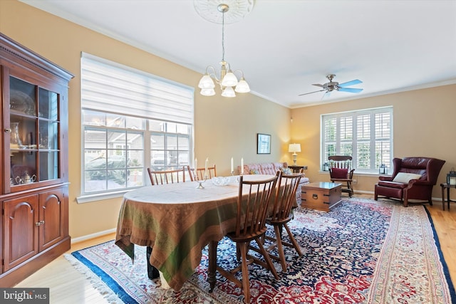 151 Lattice Ln, Collegeville, PA 19426 - dining room featuring light wood-style floors, crown molding, a chandelier, and a ceiling fan
