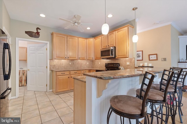 151 Lattice Ln, Collegeville, PA 19426 - kitchen with black appliances, light brown cabinetry, a peninsula, a breakfast bar, and ornamental molding