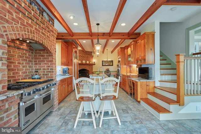 35175 Snickersville Tpke, Round Hill, VA 20141 - kitchen with stainless steel appliances, a kitchen island with sink, beam ceiling, stone finish floors, and tasteful backsplash