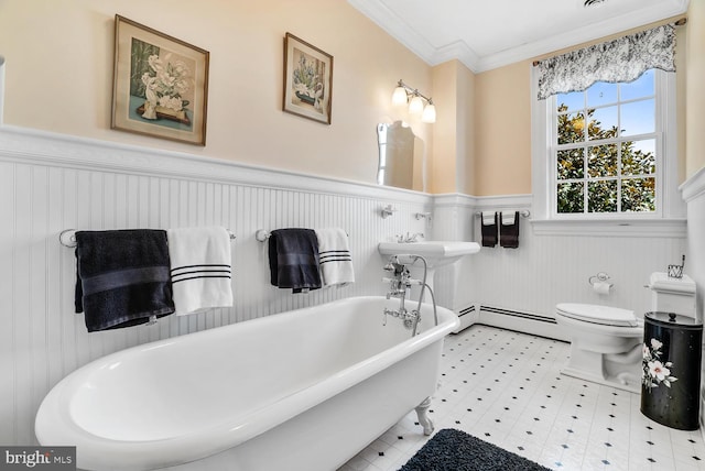 35175 Snickersville Tpke, Round Hill, VA 20141 - bathroom featuring a wainscoted wall, a soaking tub, a baseboard heating unit, toilet, and crown molding