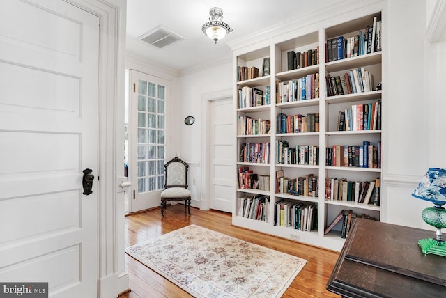 35175 Snickersville Tpke, Round Hill, VA 20141 - sitting room featuring wood finished floors and ornamental molding