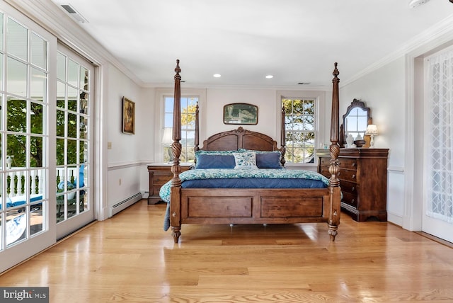35175 Snickersville Tpke, Round Hill, VA 20141 - bedroom featuring baseboard heating, crown molding, light wood-style floors, access to outside, and a decorative wall