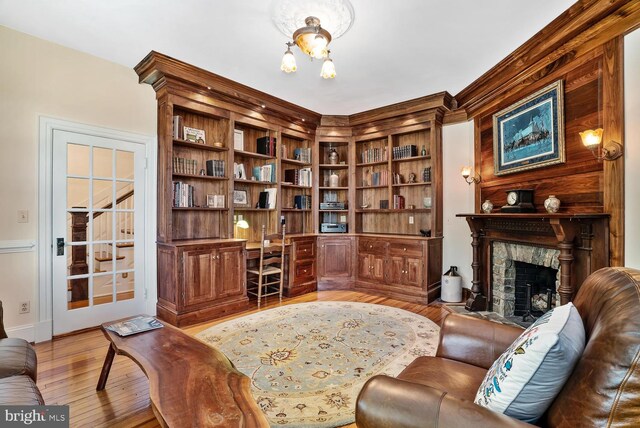 35175 Snickersville Tpke, Round Hill, VA 20141 - office with light wood finished floors, a fireplace, a chandelier, and baseboards