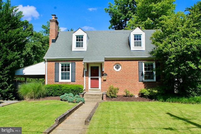 2907 Summerfield Rd, Falls Church, VA 22042 - new england style home with brick siding, a front lawn, and a chimney