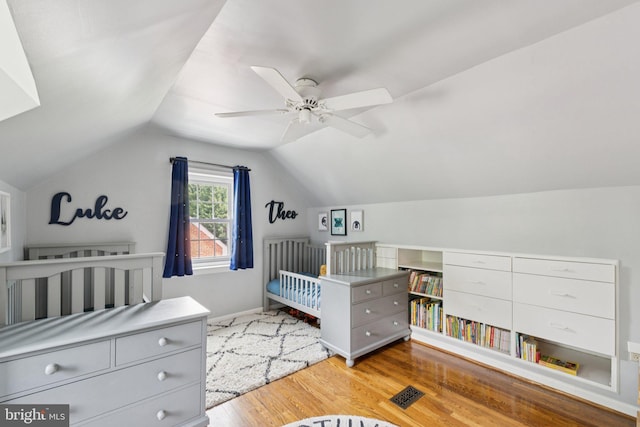2907 Summerfield Rd, Falls Church, VA 22042 - bedroom featuring light wood-style floors, lofted ceiling, ceiling fan, and a crib