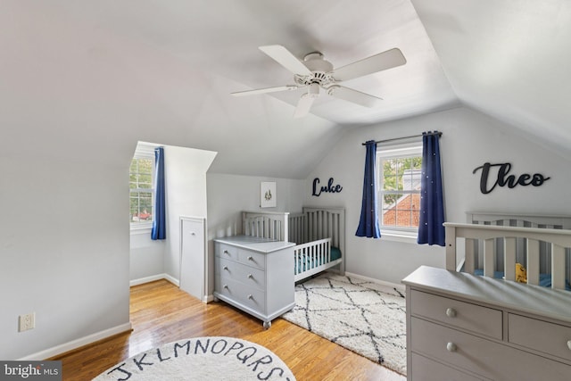 2907 Summerfield Rd, Falls Church, VA 22042 - bedroom with a crib, wood finished floors, lofted ceiling, and ceiling fan