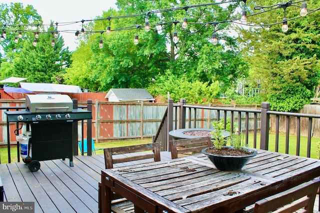 2907 Summerfield Rd, Falls Church, VA 22042 - wooden deck featuring a fenced backyard, outdoor dining space, and area for grilling