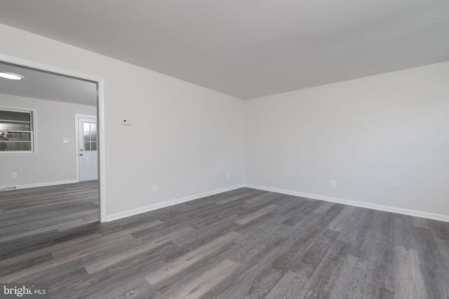 3220 Dupuy Rd, Colonial Heights, VA 23834 - unfurnished room with dark wood-type flooring and baseboards