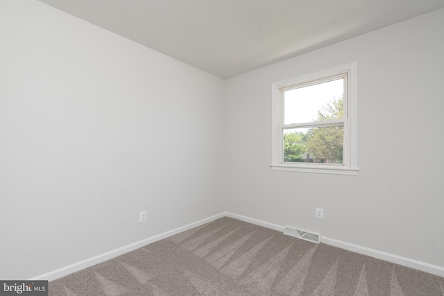 3220 Dupuy Rd, Colonial Heights, VA 23834 - unfurnished room with dark carpet and baseboards