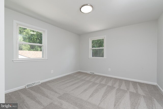 3220 Dupuy Rd, Colonial Heights, VA 23834 - carpeted empty room with healthy amount of natural light and baseboards