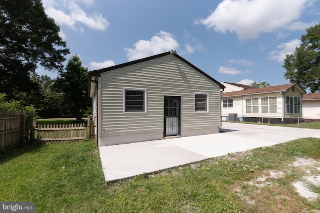 3220 Dupuy Rd, Colonial Heights, VA 23834 - back of property with a patio area and central AC unit