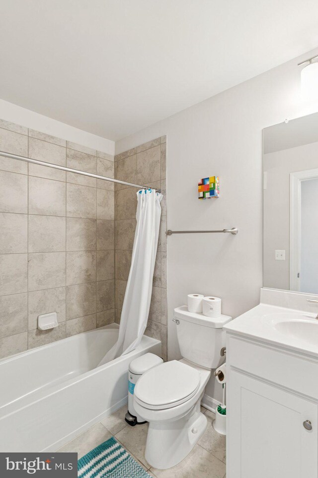 5504 Lanteen St, Lanham, MD 20706 - full bathroom featuring toilet, vanity, shower / tub combo, and tile patterned flooring