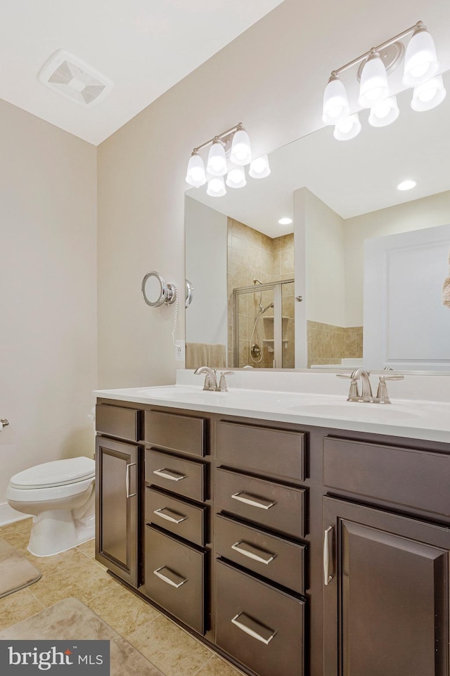 9726 Knowledge Dr, Laurel, MD 20723 - full bathroom featuring double vanity, a stall shower, toilet, and tile patterned floors