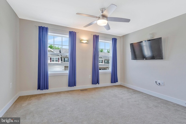 9726 Knowledge Dr, Laurel, MD 20723 - empty room featuring carpet floors, ceiling fan, and baseboards