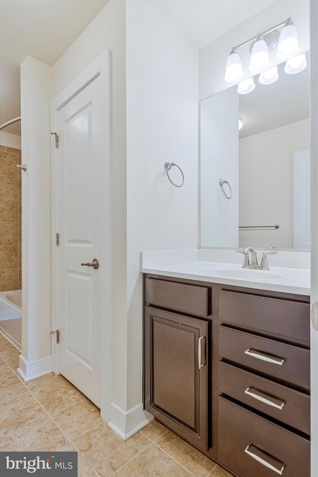 9726 Knowledge Dr, Laurel, MD 20723 - full bath with tile patterned flooring, vanity, shower / bath combination, and baseboards