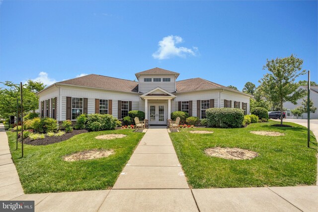 9726 Knowledge Dr, Laurel, MD 20723 - view of front facade featuring french doors, a front lawn, and roof with shingles