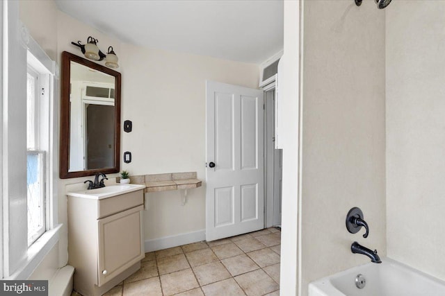 413 E A St, Brunswick, MD 21716 - full bath featuring vanity, tile patterned flooring, and bathing tub / shower combination