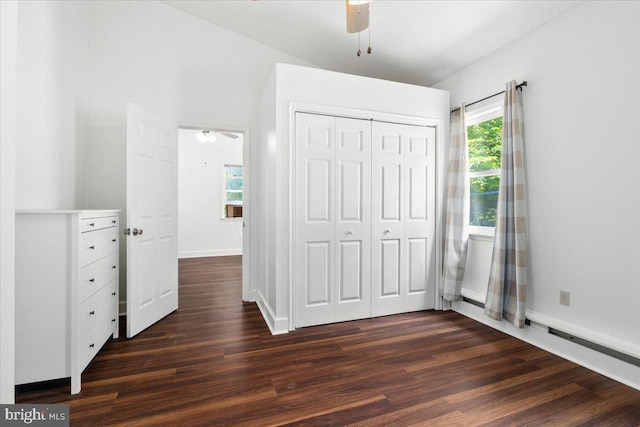 413 E A St, Brunswick, MD 21716 - unfurnished bedroom featuring dark wood-style floors, a closet, and a ceiling fan
