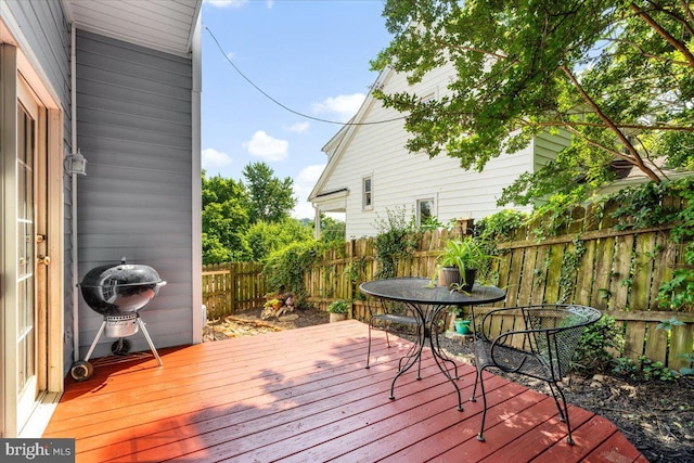 413 E A St, Brunswick, MD 21716 - wooden deck featuring a fenced backyard
