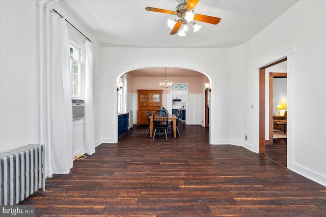 413 E A St, Brunswick, MD 21716 - hallway featuring radiator heating unit, arched walkways, a chandelier, and wood finished floors