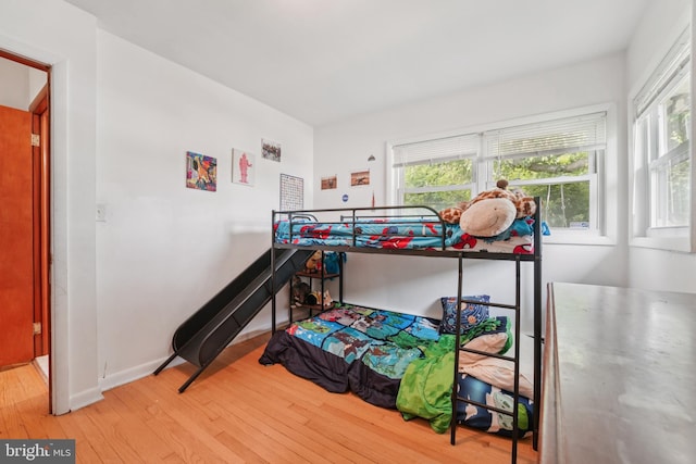 1323 Dorchester Ave, Gwynn Oak, MD 21207 - bedroom with hardwood / wood-style floors and multiple windows