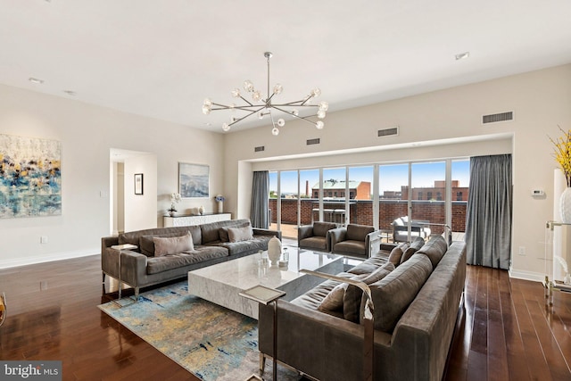 3251 Prospect St NW Unit 402, Washington, DC 20007 - living area with a chandelier, baseboards, and dark wood-type flooring