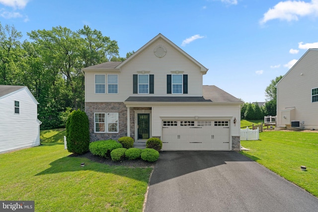 3611 Cogswell Ct, Abingdon, MD 21009 - traditional home featuring stone siding, driveway, a garage, and a front yard