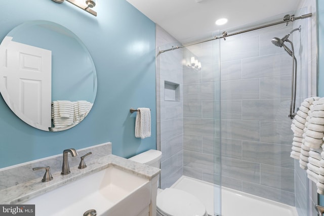 3611 Cogswell Ct, Abingdon, MD 21009 - bathroom with tiled shower, vanity, and toilet