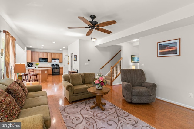 3611 Cogswell Ct, Abingdon, MD 21009 - living room featuring light wood finished floors, stairway, a ceiling fan, recessed lighting, and baseboards