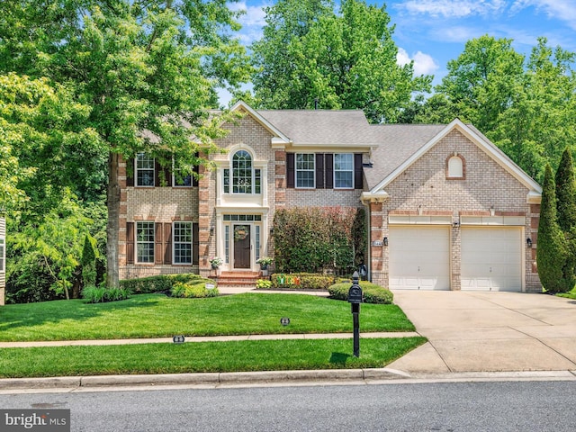15446 Symondsbury Way, Upper Marlboro, MD 20774 - georgian-style home with concrete driveway, an attached garage, a front yard, brick siding, and roof with shingles