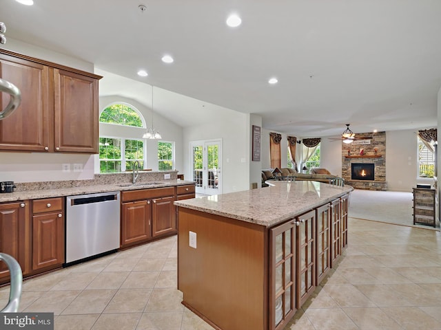15446 Symondsbury Way, Upper Marlboro, MD 20774 - kitchen with dishwasher, light tile patterned flooring, light stone counters, lofted ceiling, and a ceiling fan