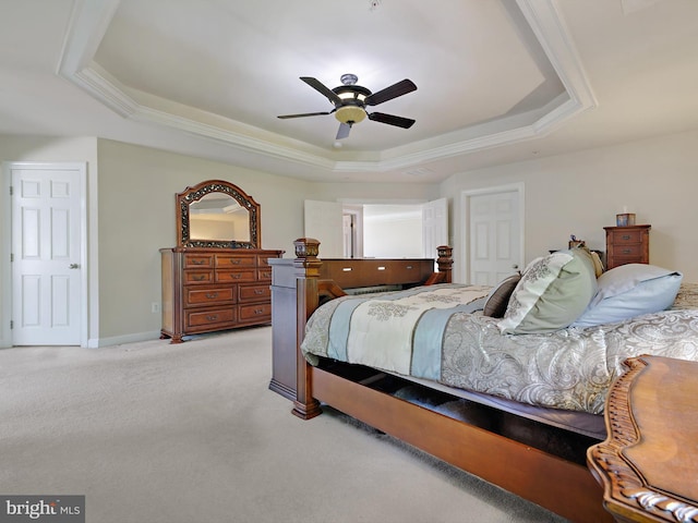 15446 Symondsbury Way, Upper Marlboro, MD 20774 - bedroom featuring a tray ceiling, light colored carpet, crown molding, a ceiling fan, and baseboards