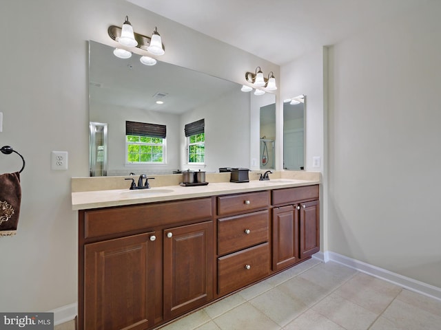 15446 Symondsbury Way, Upper Marlboro, MD 20774 - bathroom with double vanity, baseboards, and tile patterned flooring