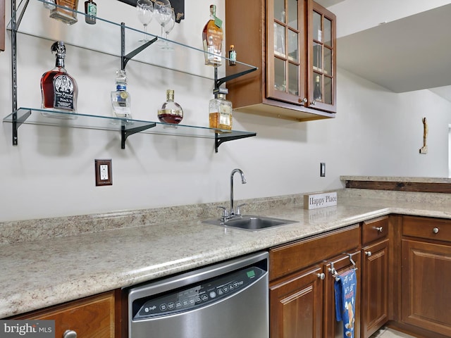 15446 Symondsbury Way, Upper Marlboro, MD 20774 - kitchen featuring dishwasher, a sink, glass insert cabinets, and brown cabinetry