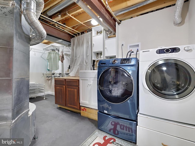 15446 Symondsbury Way, Upper Marlboro, MD 20774 - laundry room featuring cabinet space and separate washer and dryer